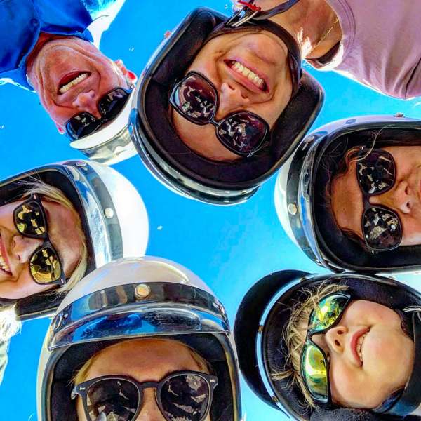 a close up of a couple of people that are wearing sunglasses