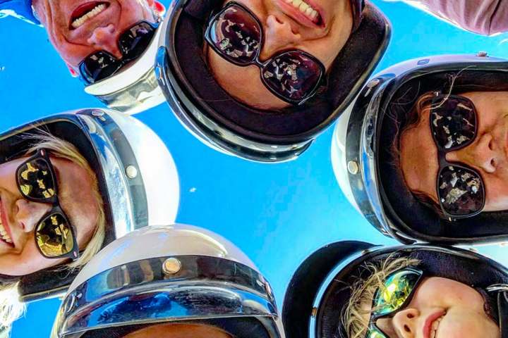 a close up of a couple of people that are wearing sunglasses